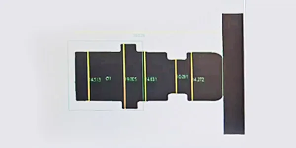 Side-camera measurement view: a stepped shaft with dimension lines overlaid on the silhouette