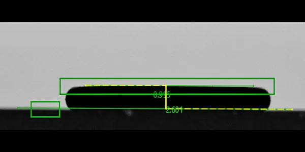 Nano Glass Disc camera view: part silhouette with the measurement overlays — a flat washer measured on the disc