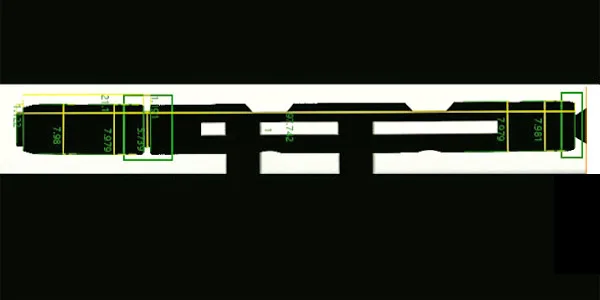 Thru Scan camera view: part silhouette with the measurement overlays — a shaft with measurement boxes along its length